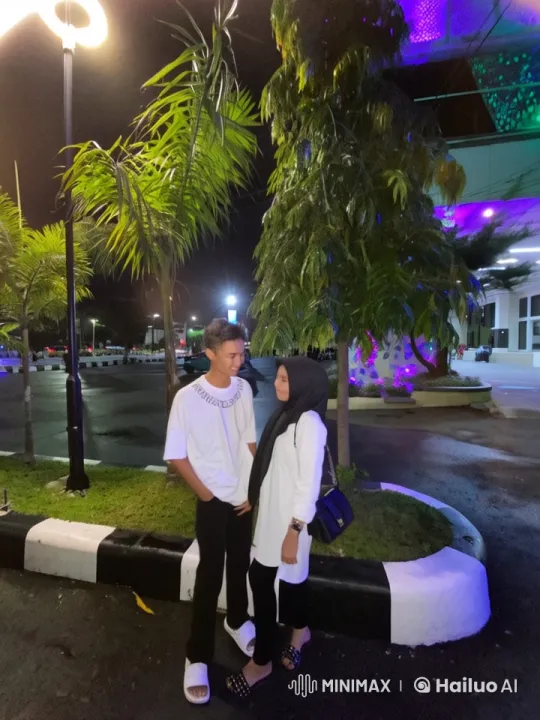 Young Couple Performs Synchronized Kung Fu in Nighttime Setting – AI Generated Video | Hailuo AI