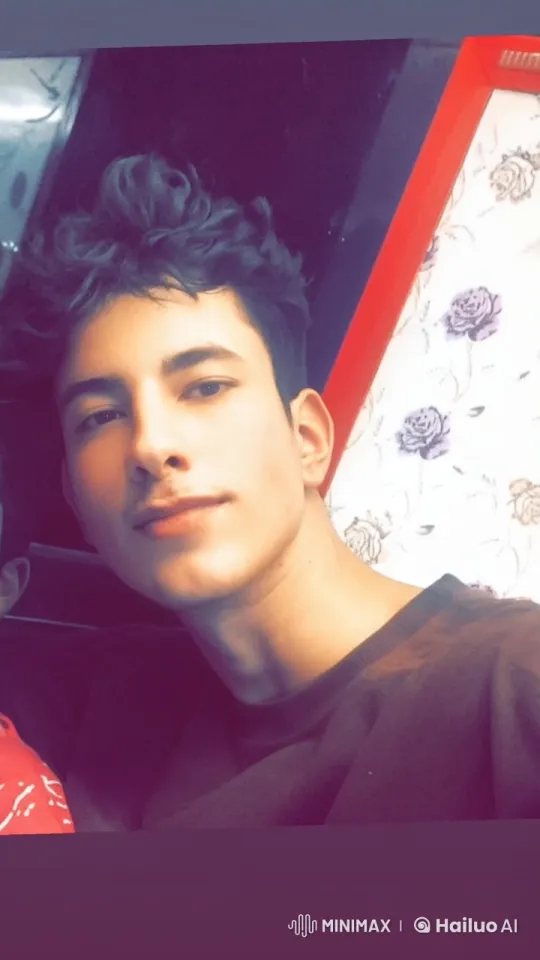 Young Man Smoking with Animated Floral Background – AI Generated Video | Hailuo AI