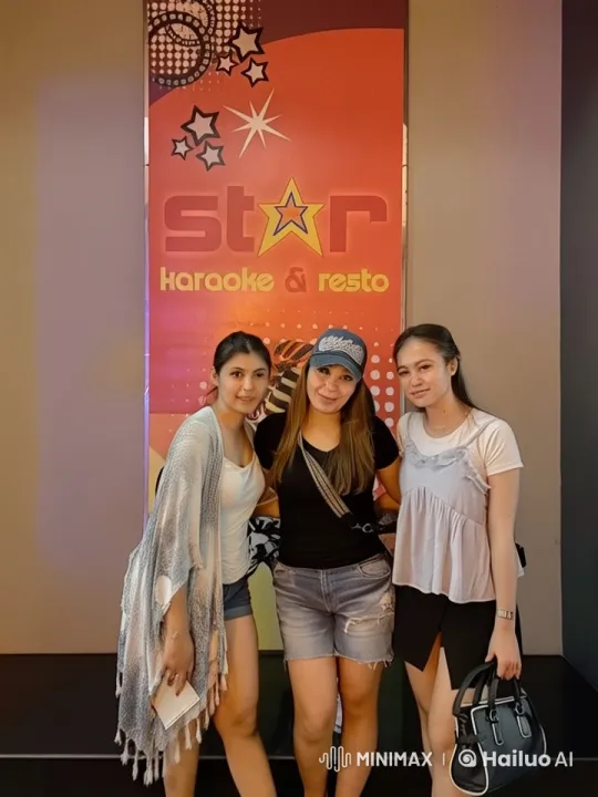 Female Friends Celebrate with Kungfu Kick at Star Karaoke – AI Generated Video | Hailuo AI