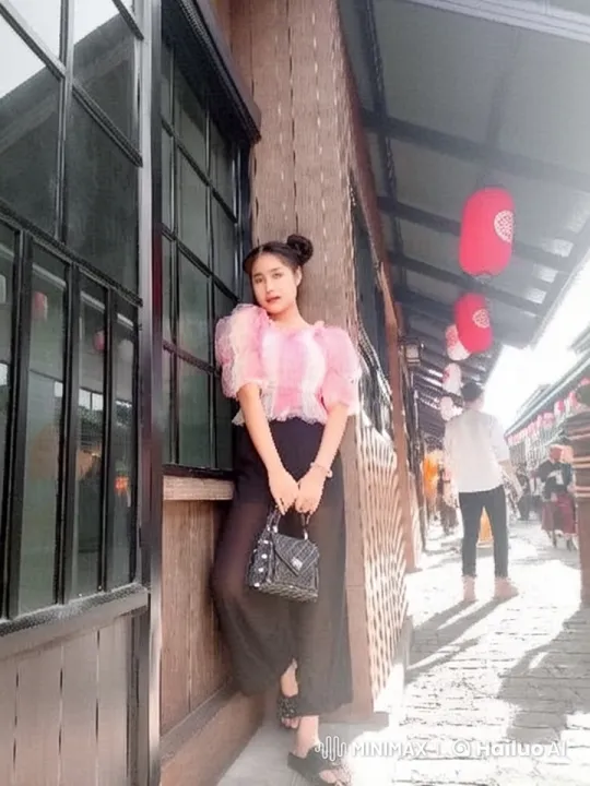 Young Woman Showcases Martial Arts in Bustling Market Street – AI Generated Video | Hailuo AI