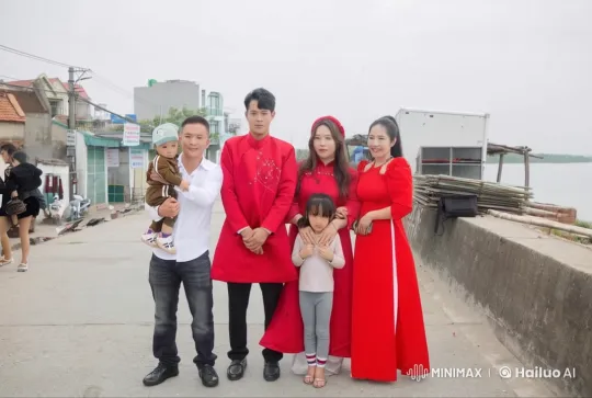 Family Performs Kung Fu in Traditional Attire by Riverside – AI Generated Video | Hailuo AI