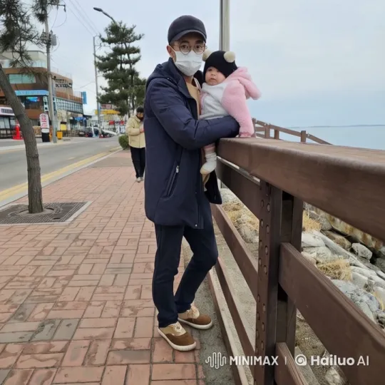 Man and Baby Enjoy Seaside Moment – AI Generated Video | Hailuo AI