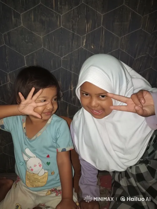 Children in Pajamas and Hijab Interact with Subtle Animations – AI Generated Video | Hailuo AI