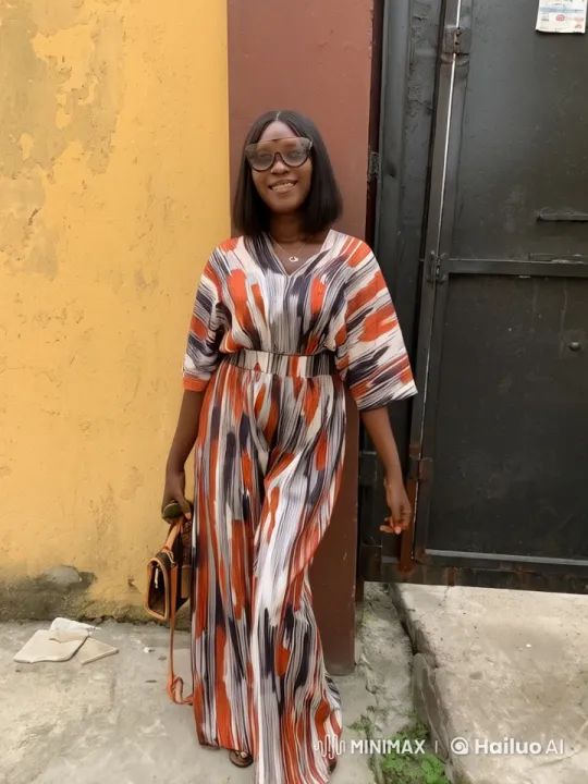Woman in Maxi Dress Showcases Grace in Urban Setting – AI Generated Video | Hailuo AI