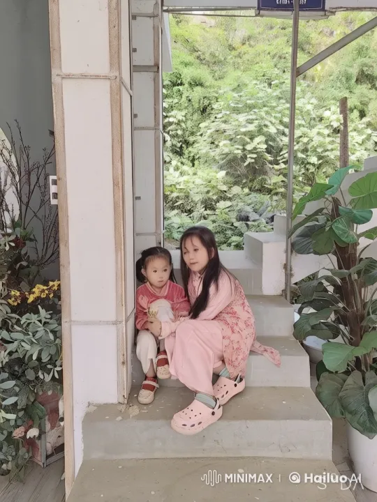 Child and Adult Share a Moment on Concrete Steps – AI Generated Video | Hailuo AI