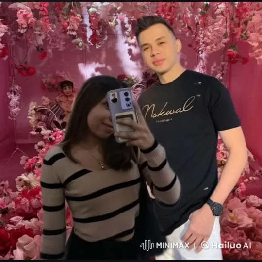 Young Couple Takes Selfie in Romantic Flower-Decorated Room – AI Generated Video | Hailuo AI