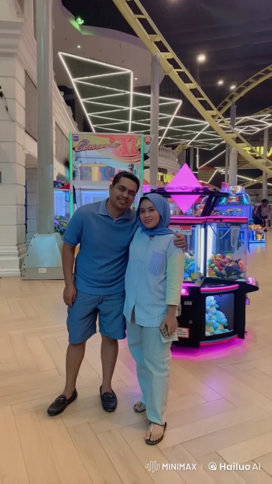 Couple Performs Energetic Kung Fu in Neon-Lit Arcade – AI Generated Video | Hailuo AI