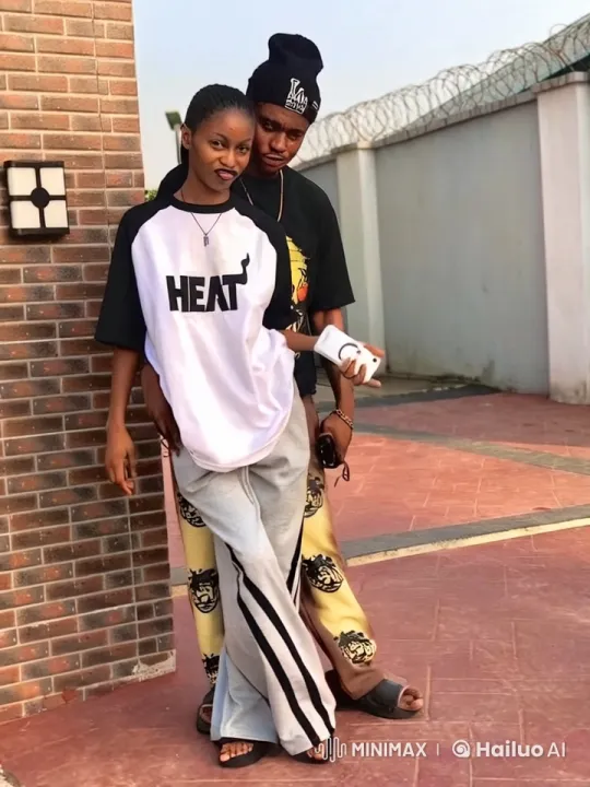 Playful Combat Scene Between Two Individuals in Casual Clothing – AI Generated Video | Hailuo AI