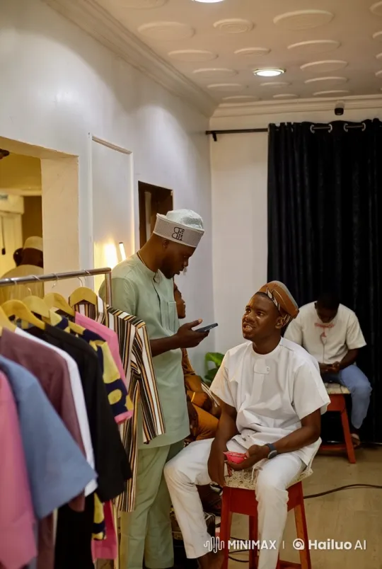 African Attired Men Showcase Martial Arts in Fashion Boutique Setting – AI Generated Video | Hailuo AI