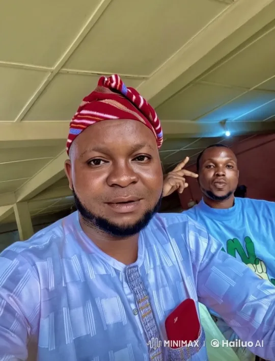 Live2D Video: Two Men in Traditional and Graphic Shirts with Peace Sign – AI Generated Video | Hailuo AI