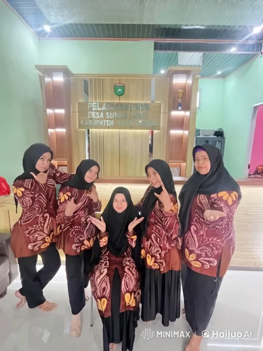Traditional Batik Attired Women Showcase Kung Fu in Modern Office – AI Generated Video | Hailuo AI