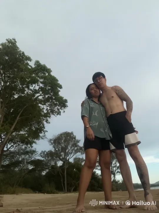 Couple's Playful Fight Mimicking Jackie Chan on the Beach – AI Generated Video | Hailuo AI