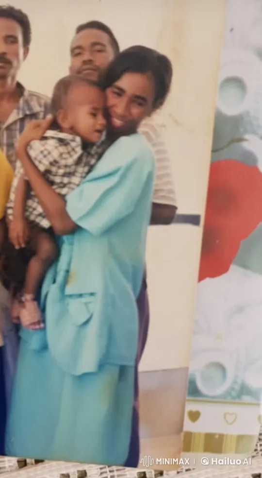 Affectionate Woman Holding Child in Colorful Setting – AI Generated Video | Hailuo AI