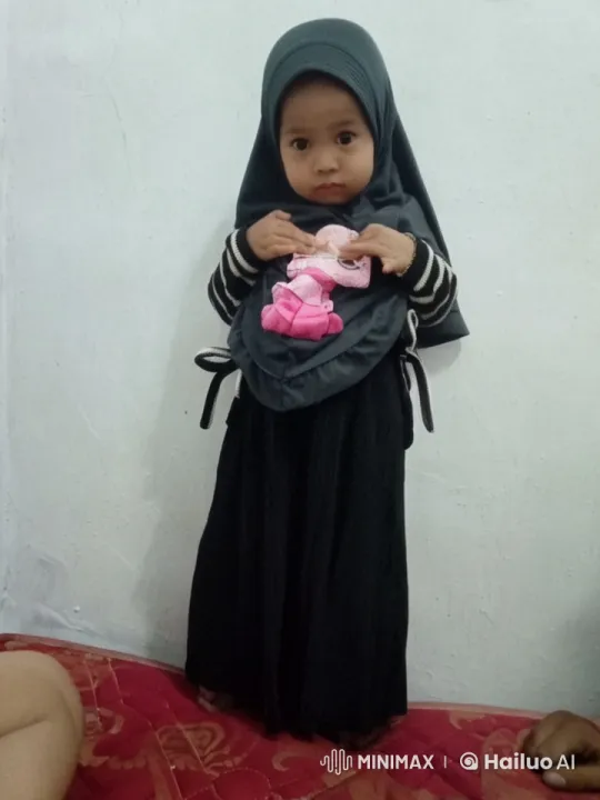 Young Girl with Doll: A Tender, Intimate Moment – AI Generated Video | Hailuo AI