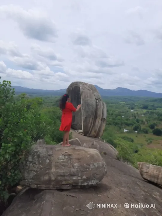 Woman Initiates Rolling Stone on Verdant Hilltop – AI Generated Video | Hailuo AI