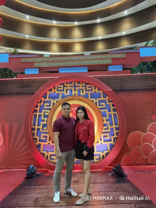 Couple Performs Energetic Kung Fu on Chinese-Themed Stage – AI Generated Video | Hailuo AI