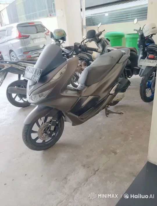 Modern Scooter Garage: Kungfu Fighter Showcases Mastery – AI Generated Video | Hailuo AI