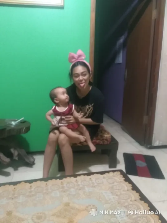 Young Woman Performs Kungfu with Baby in Background – AI Generated Video | Hailuo AI