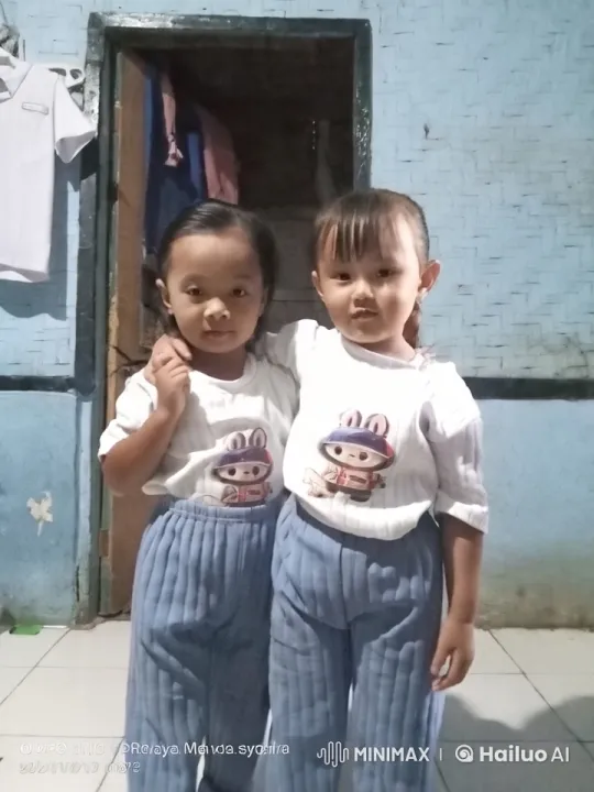 Affectionate Siblings Pose in Cozy Indoor Setting – AI Generated Video | Hailuo AI