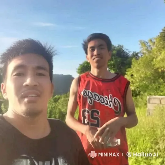 Two Men Fight Energetically in a Lush Outdoor Setting – AI Generated Video | Hailuo AI