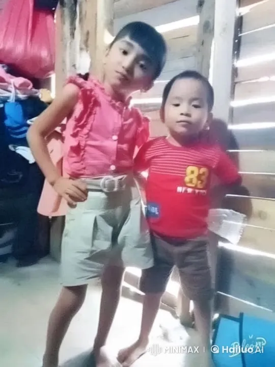 Children Posed Cheerfully in Rustic Wooden Interior – AI Generated Video | Hailuo AI