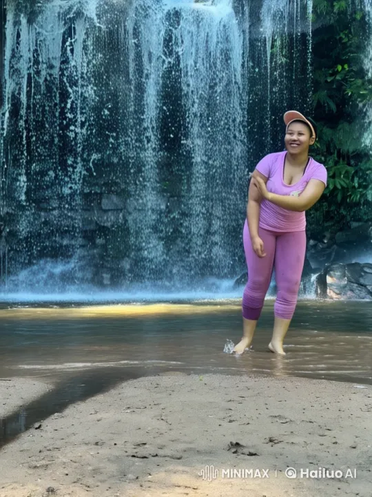 Martial Artist Performs Gracefully in Waterfall Setting – AI Generated Video | Hailuo AI