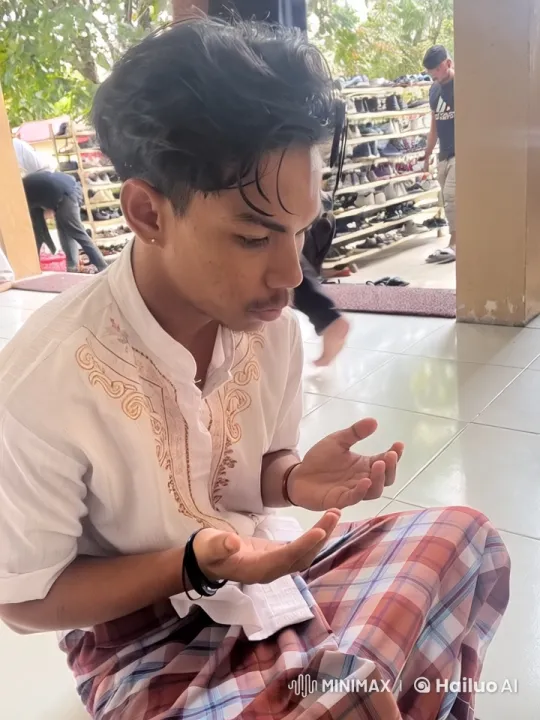 Young Man Receiving Money Amidst Lively Indoor Scene – AI Generated Video | Hailuo AI