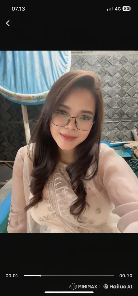 Elegant Woman in Translucent Outfit by Swimming Pool – AI Generated Video | Hailuo AI