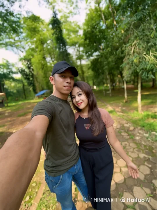 Couple Taking Selfie in Peaceful Park Setting – AI Generated Video | Hailuo AI
