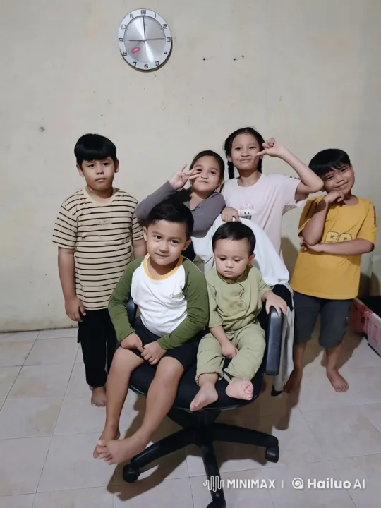Children in Casual Attire Interact in a Simple Indoor Setting – AI Generated Video | Hailuo AI