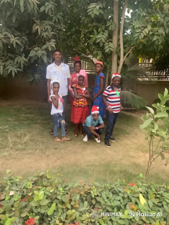 Animated Scene: Children in Traditional Outfits by Festive Garden – AI Generated Video | Hailuo AI