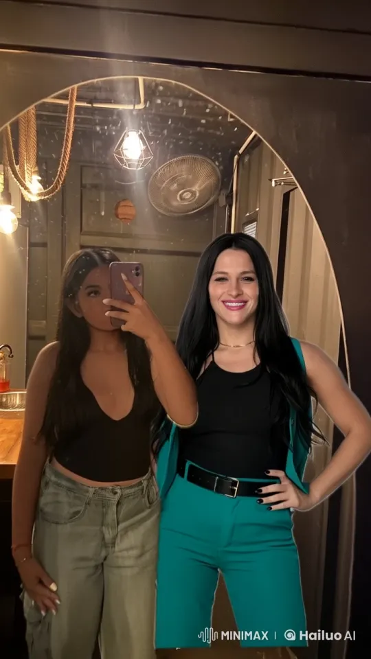 Friends Share a Warm Hug in Stylish Mirror Scene – AI Generated Video | Hailuo AI