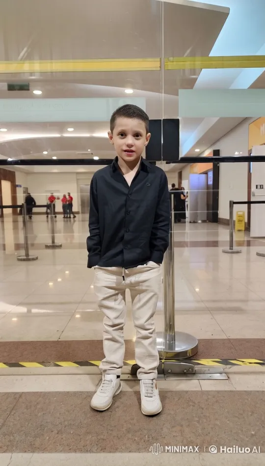 Boy Meets Santa in Modern Indoor Scene – AI Generated Video | Hailuo AI