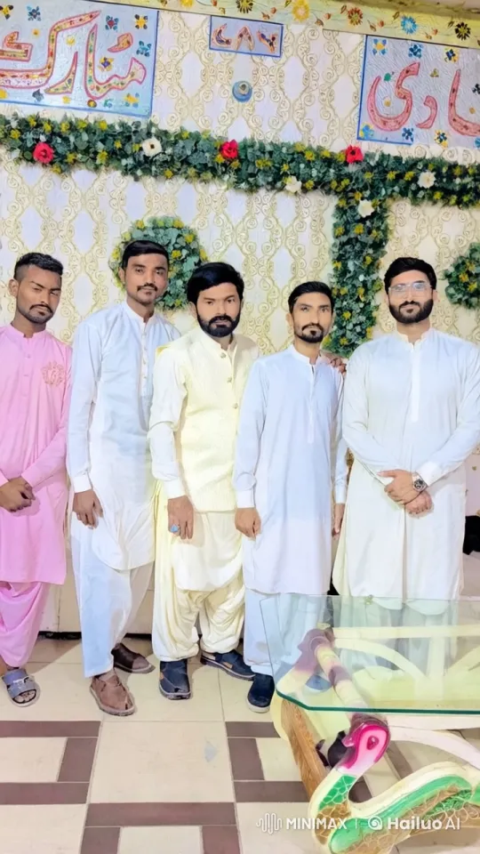 Traditional Men Perform Dynamic Kung Fu Against Floral Backdrop – AI Generated Video | Hailuo AI