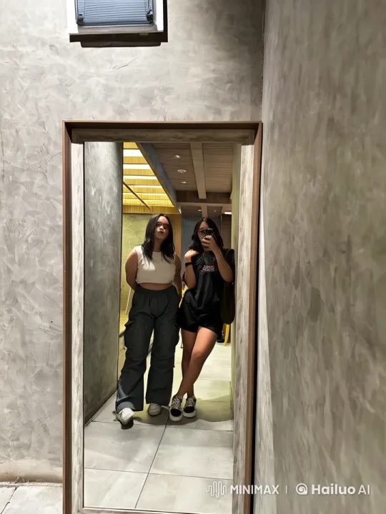 Two Women Practicing Kungfu in Modern Hallway – AI Generated Video | Hailuo AI