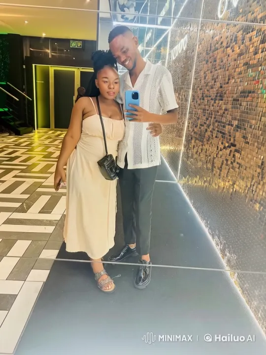 Couple's Stylish Kung Fu Performance in Modern Lobby – AI Generated Video | Hailuo AI