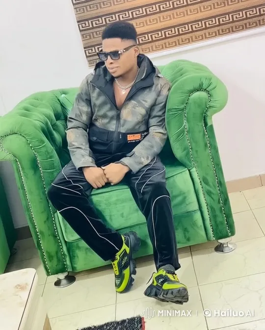 Man in Camo Jacket Walks Through Room in Live2D Animation – AI Generated Video | Hailuo AI
