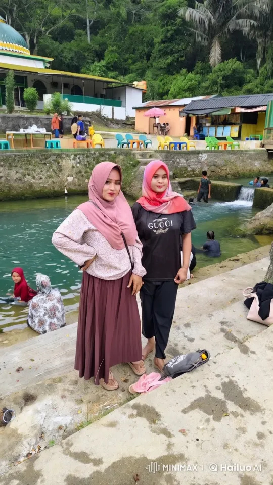 Women in Hijabs Enjoy Peaceful Streamside Picnic – AI Generated Video | Hailuo AI