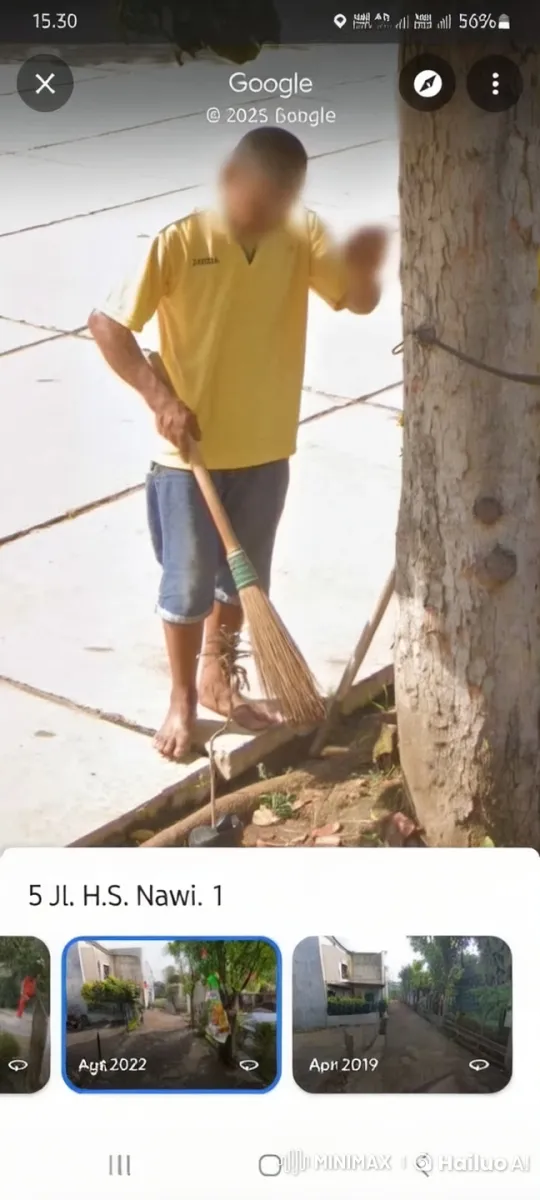 Man Sweeps Street with Natural Broom Under Tree – AI Generated Video | Hailuo AI