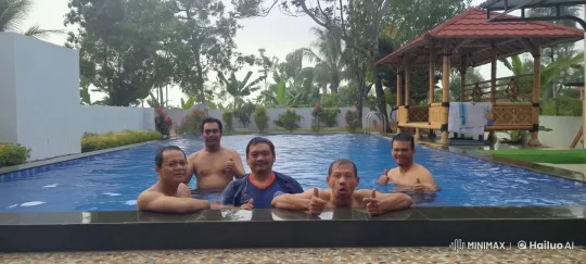 Badui Men Enjoying Pool Time in Tropical Setting – AI Generated Video | Hailuo AI