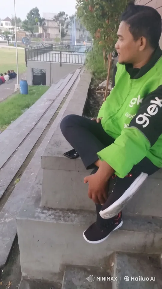Vibrant Person Relaxing on Steps in Animated Park Setting – AI Generated Video | Hailuo AI