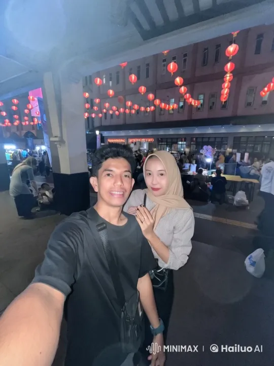 Romantic Couple Kiss Under Red Lanterns at Night Market – AI Generated Video | Hailuo AI