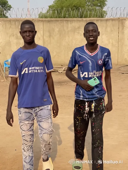 Young friends enjoy casual walk and playful antics – AI Generated Video | Hailuo AI