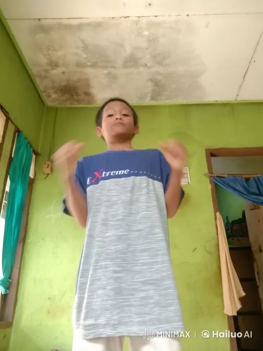 Child in Green Room with Animated Gestures – AI Generated Video | Hailuo AI