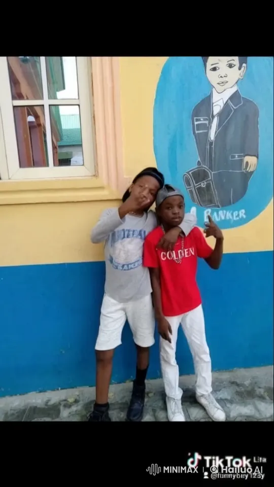 Boys Display Playful Kung Fu Skills in Front of Mural – AI Generated Video | Hailuo AI