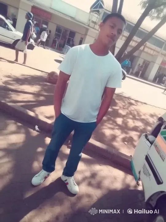 Young Man Practicing Kung Fu on Sidewalk with Animated Background – AI Generated Video | Hailuo AI