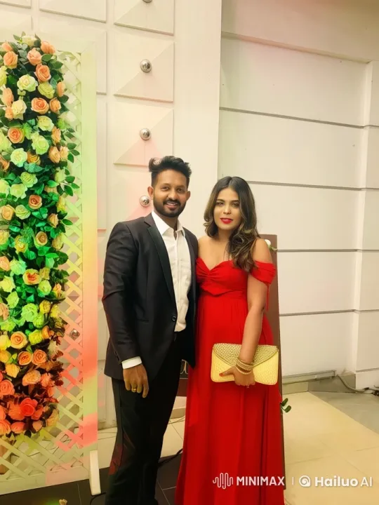 Couple in Elegant Attire Amidst Flowery Background – AI Generated Video | Hailuo AI