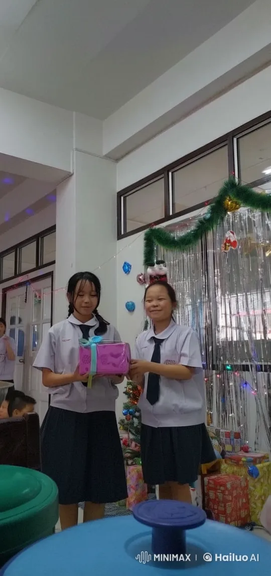 Schoolgirls Exchange Gifts and Playful Affection in Festive Setting – AI Generated Video | Hailuo AI