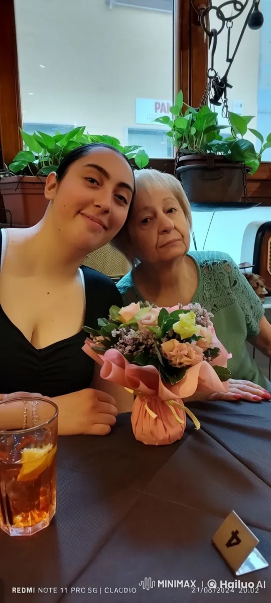 Intimate Dining Scene with Embrace and Floral Centerpiece – AI Generated Video | Hailuo AI