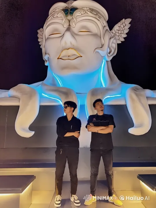 Live2D Animated Kung Fu Fight with Winged Statue Background – AI Generated Video | Hailuo AI
